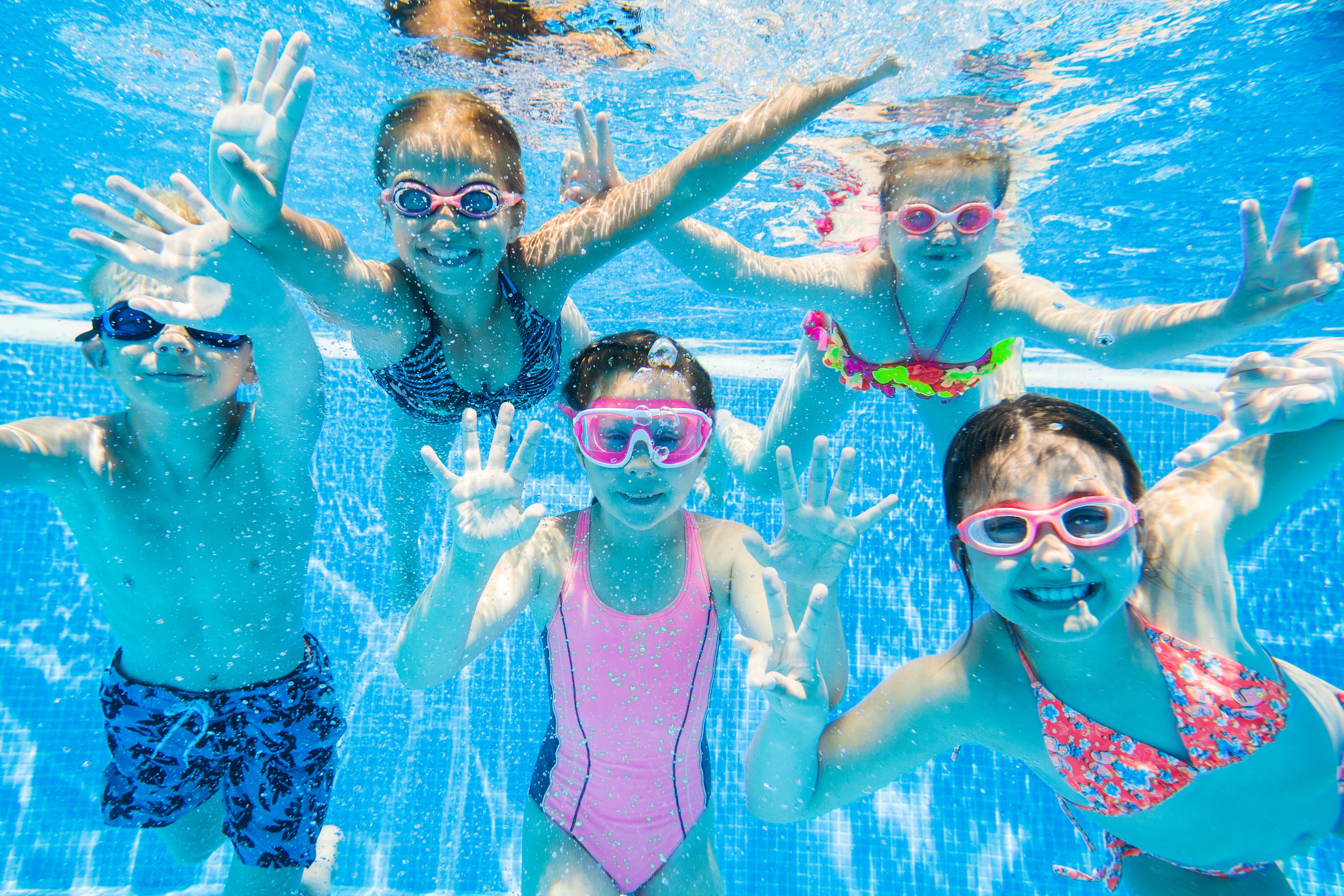 Stock image of children in a swimming pool 